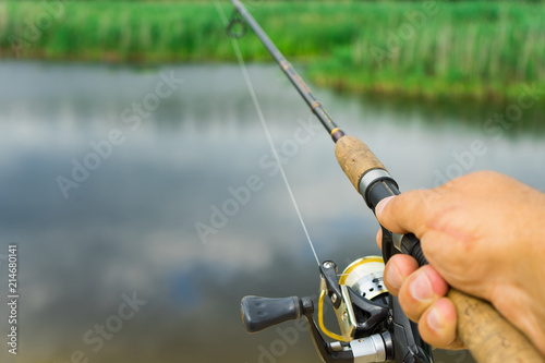Spinning fishing is an exciting activity. Sport fishing.