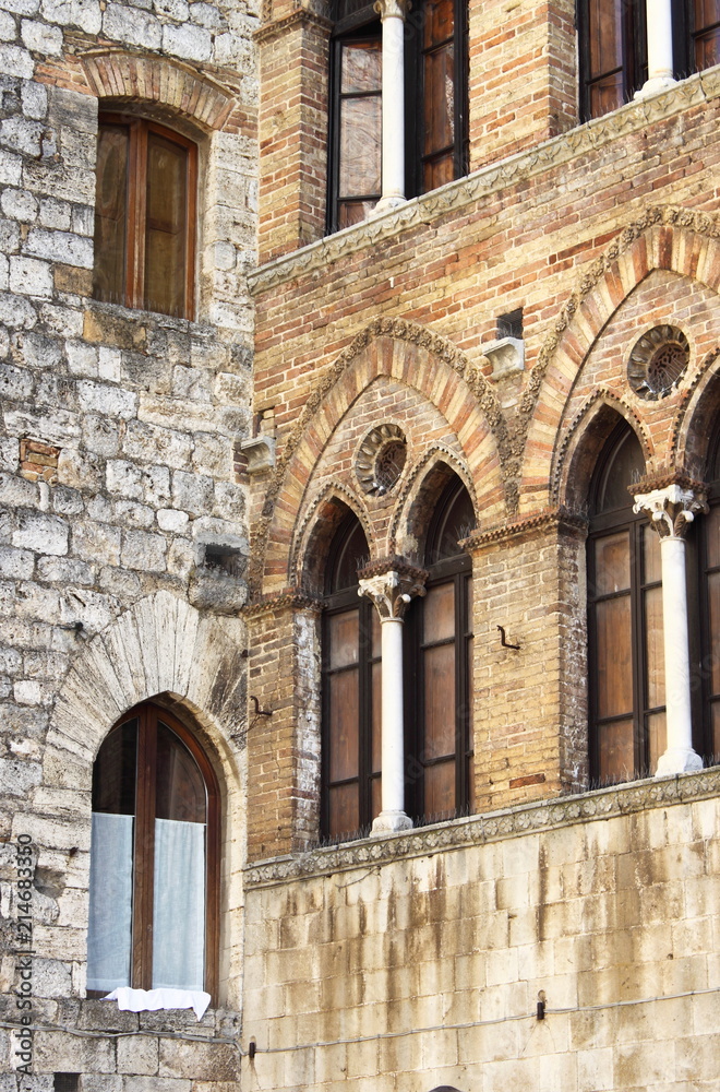 Medieval windows in San Gimignano, Italy