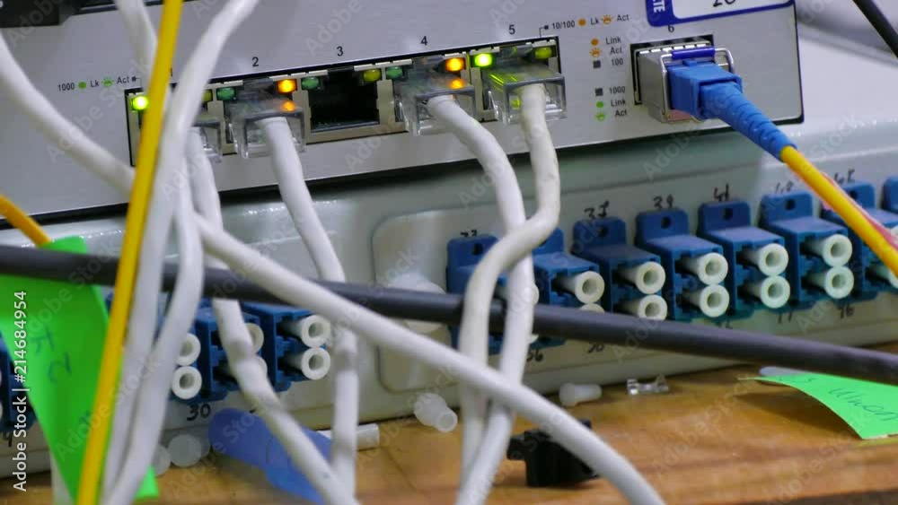 Cables Coiling Around Each Other Inside A Network Cabinet Cables Coiling Around Each Other Inside A Network Cabinet