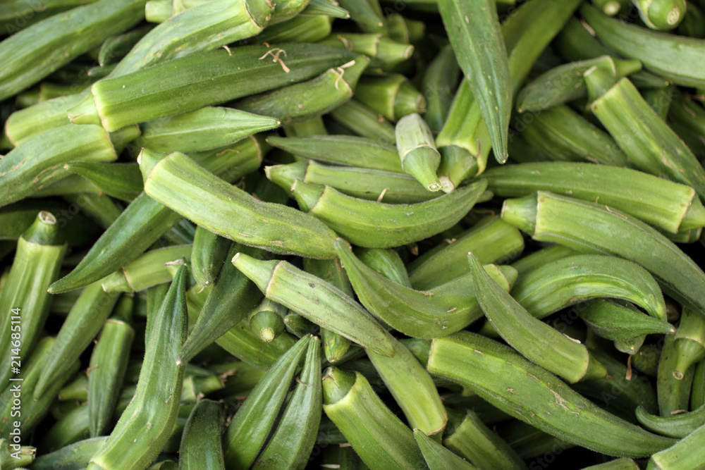 Fresh organic okra at a farmer's market. Fresh organic okra at a farmer's market.