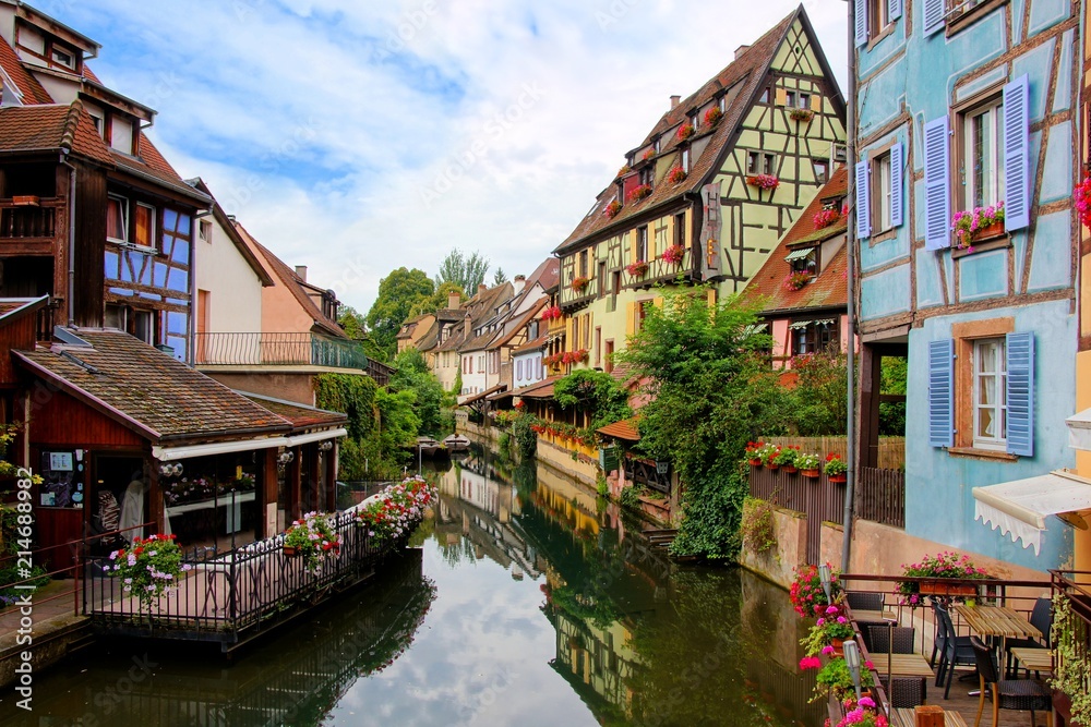 Morning view with reflections in the beautiful canals of Colmar, Alsace, France