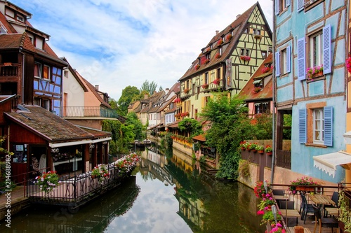 Morning view with reflections in the beautiful canals of Colmar  Alsace  France