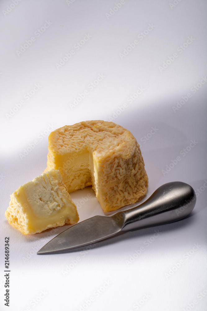 French AOC Langres soft cow crumbly cheese with washed rind stru French AOC Langres soft cow crumbly cheese with washed rind stru