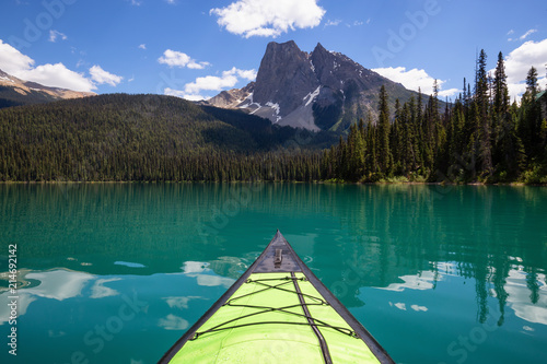 Kayaking in Emerald Lake during a vibrant sunny summer day. Located in British Columbia, Canada. © edb3_16