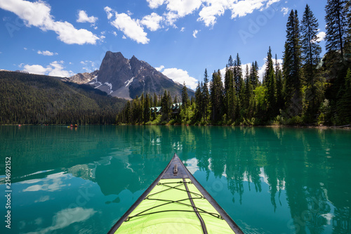 Kayaking in Emerald Lake during a vibrant sunny summer day. Located in British Columbia, Canada.