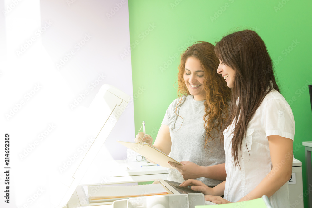 Young students at a copy center Young students at a copy center