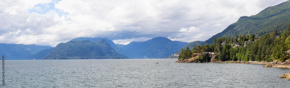 Panoramic view of Howe Sound from Lions Bay during a cloudy summer day. Taken North of Vancouver, BC, Canada
