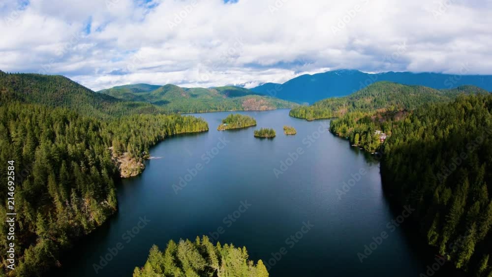 Sakinaw Lake BC Aerial Flying Through Channel Above Small Islets Sakinaw Lake BC Aerial Flying Through Channel Above Small Islets