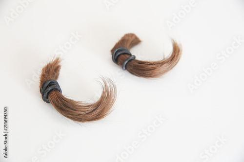 Lock of hair in a white backgorund