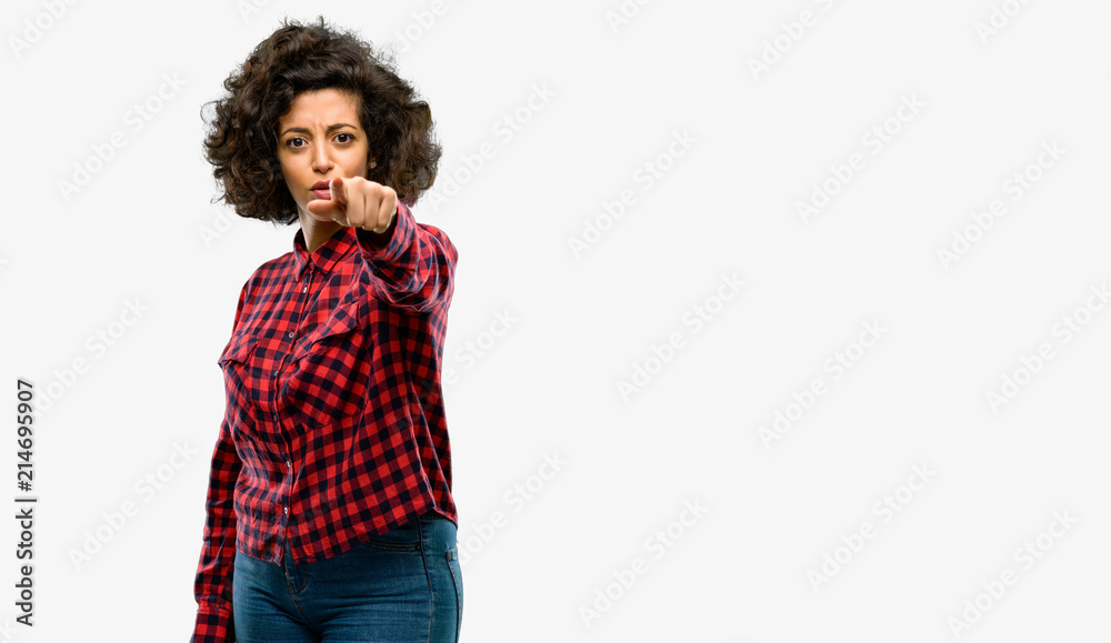 Beautiful arab woman pointing to the front with finger Beautiful arab woman pointing to the front with finger