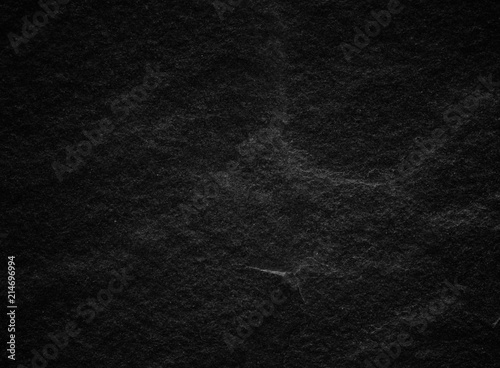 Black stone wall texture for background and design.