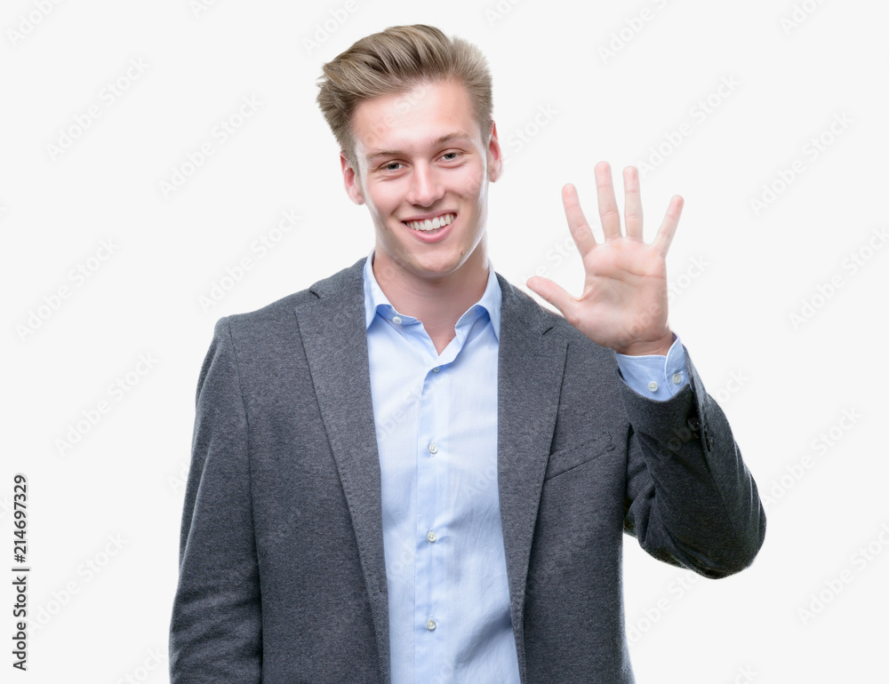 Young handsome blond business man showing and pointing up with fingers number five while smiling confident and happy. Young handsome blond business man showing and pointing up with fingers number five while smiling confident and happy.