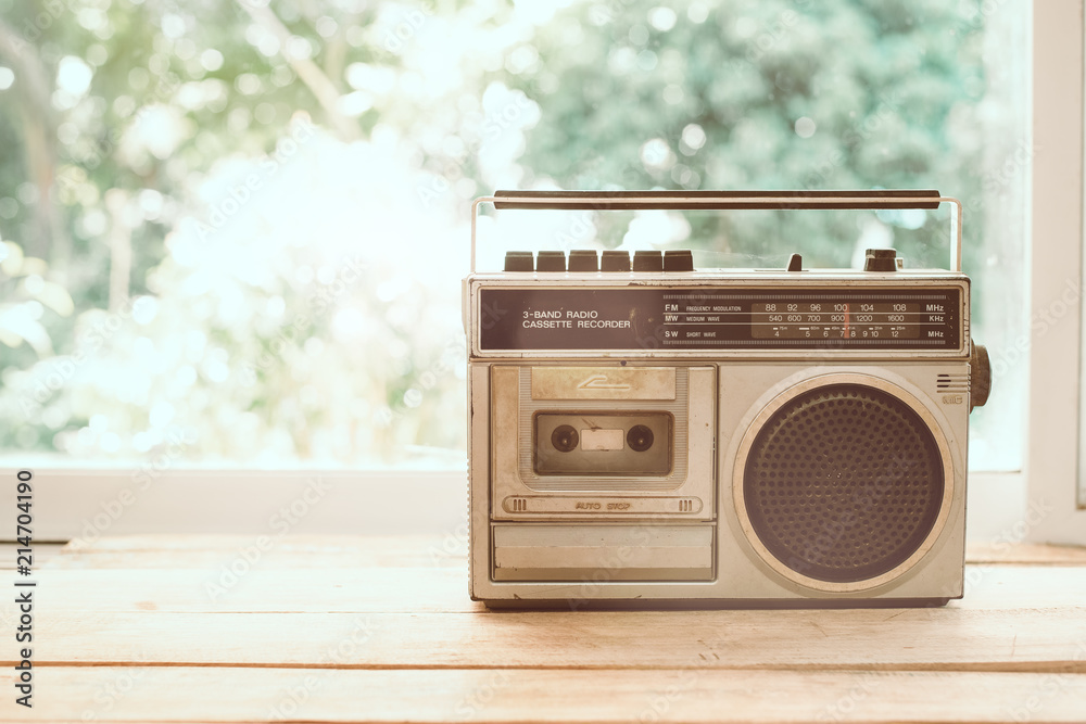 Photo of memorie and nostalgia. vintage radio or cassette reccorder in  house. vintage color tone. Stock Photo | Adobe Stock