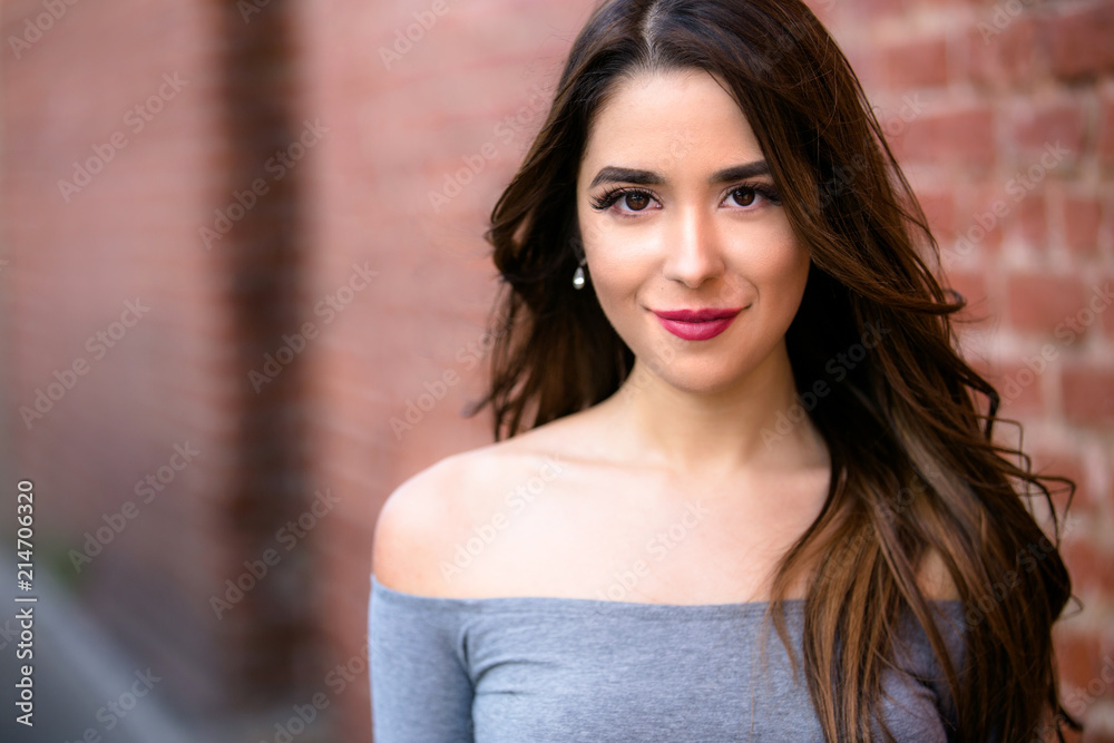 Beautiful young hispanic american woman with perfect skin, genuine casual smile Beautiful young hispanic american woman with perfect skin, genuine casual smile
