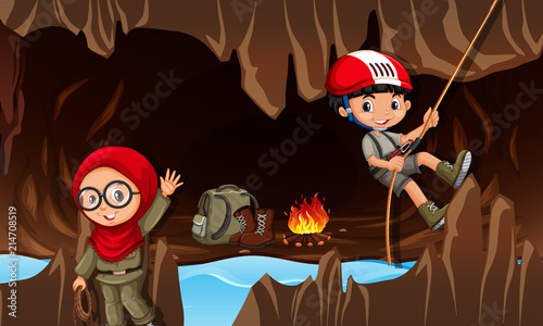 Children exploring the cave