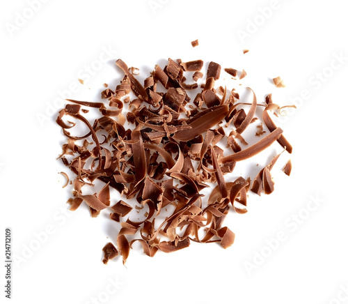 grated chocolate on white background.