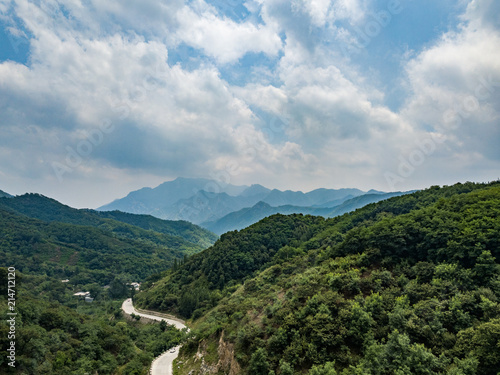 Far view of Mount Tai in summer time  with its peak was surrounded by cloud 