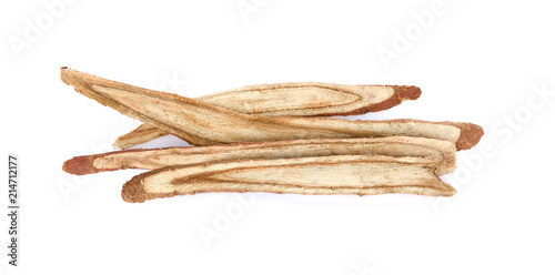 dried Liquorice roots on a white background.
