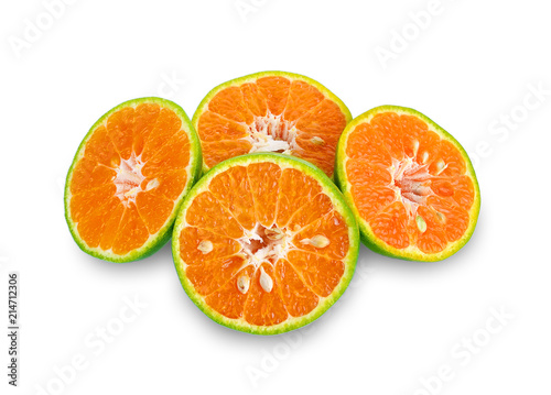 green tangerine on white background.