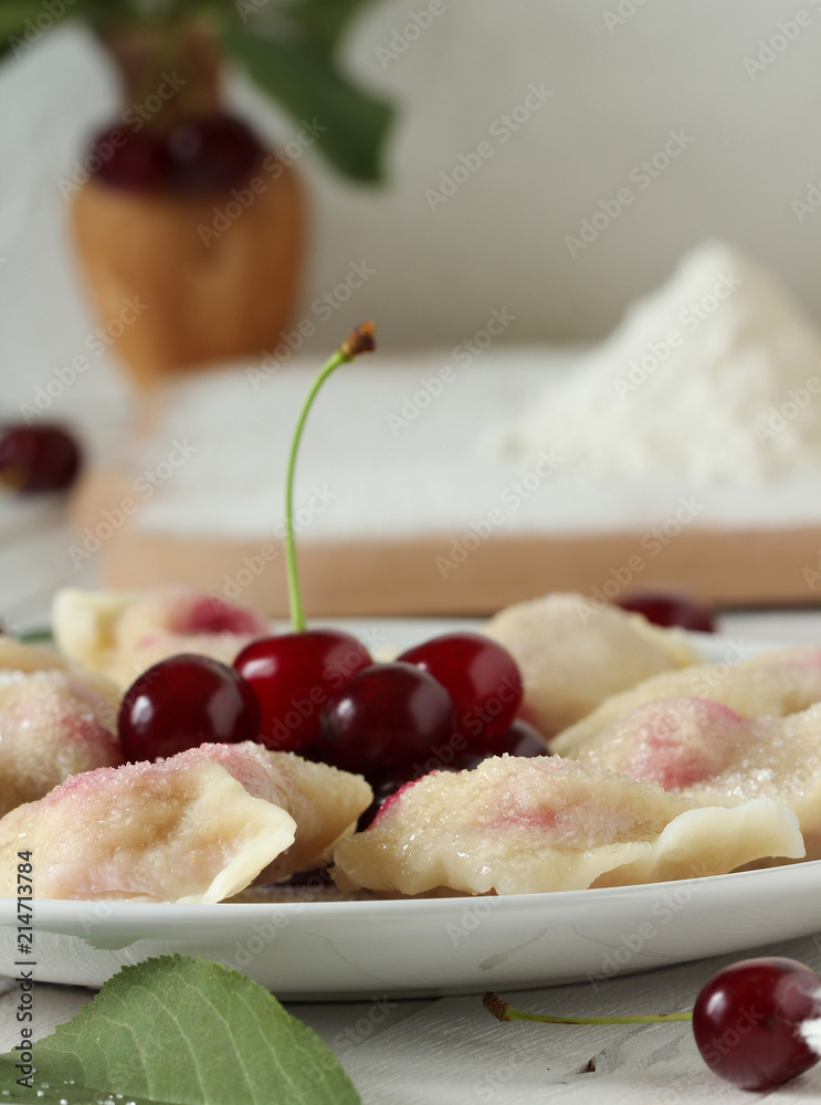 Vareniki with cherry - Ukrainian national dish Vareniki with cherry - Ukrainian national dish