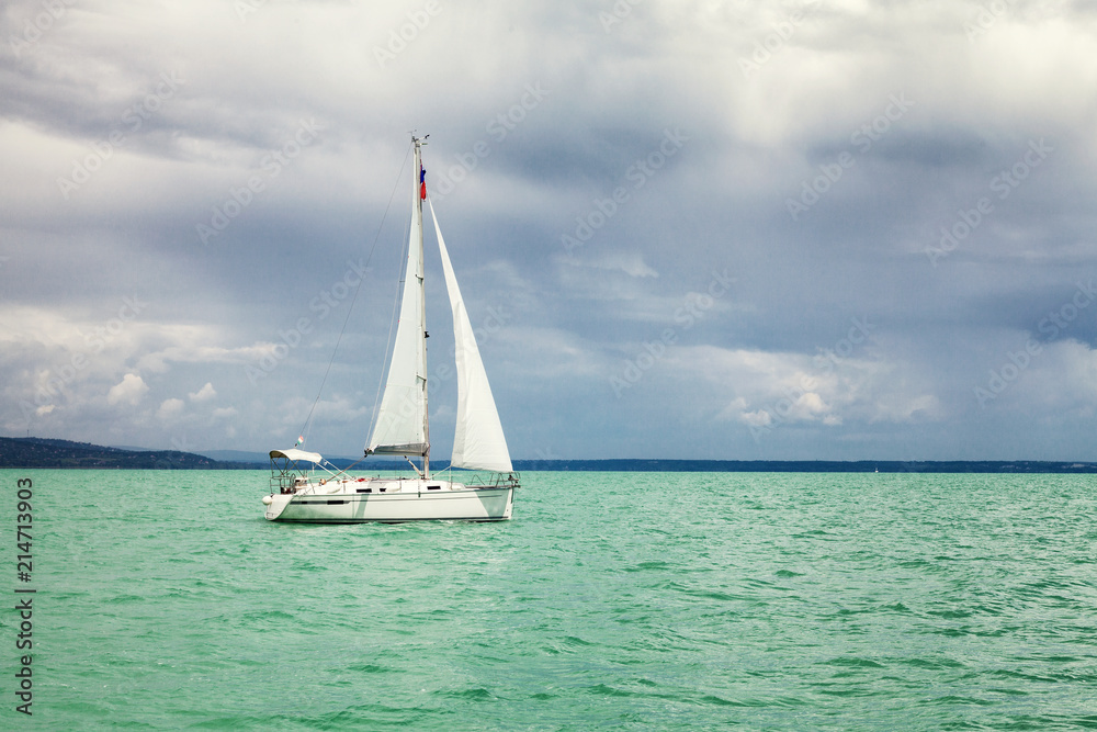 Sailing yacht in the turquoise sea, beautiful landscape