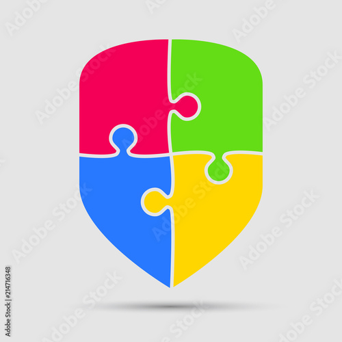 Colorful Puzzle Four Pieces Silhouette Shield.