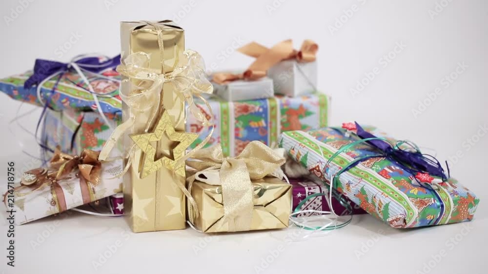 Motion controlled studio shot of some christmas gifts in front of a white background Motion controlled studio shot of some christmas gifts in front of a white background