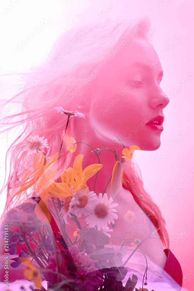 Fototapeta premium Woman with flowers inside, double exposure. Blonde girl in lingerie on crimson background, dreamy mysterious look. Wildflowers on a background of women with a double exposure on a light background