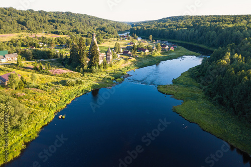 Top view of Vazhinka river in Soginicy village. Green forests of Leningrad region and Republic of Karelia, Russia.