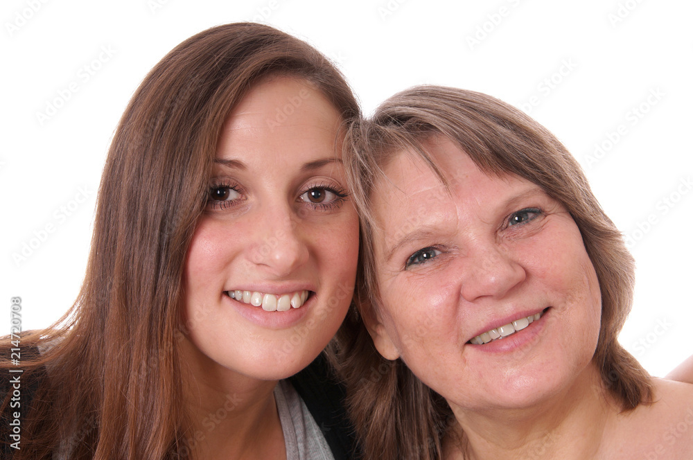 mother and daughter cheek to cheek, isolated on white mother and daughter cheek to cheek, isolated on white