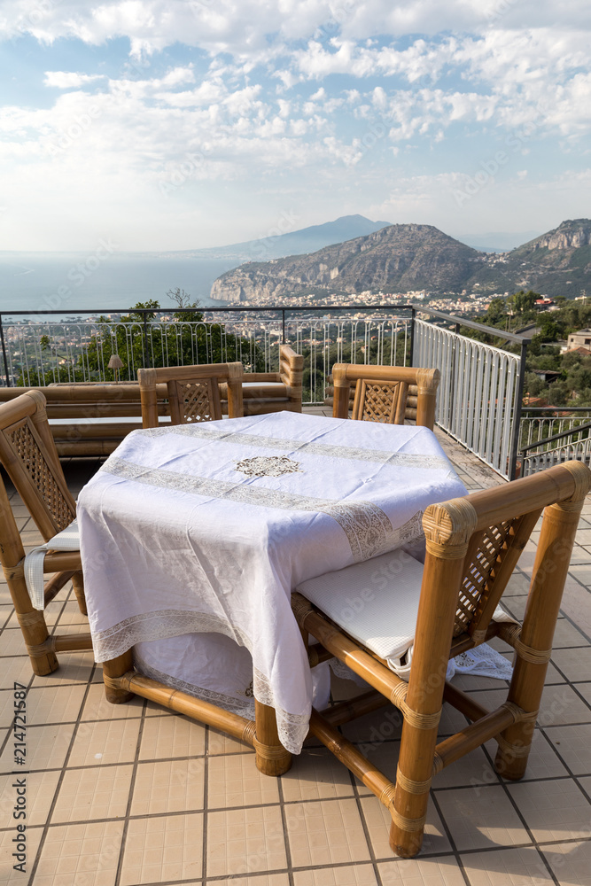 Prepared for supper table on the terrace overlooking the Bay of Naples and Vesuvius. Sorrento. Italy
