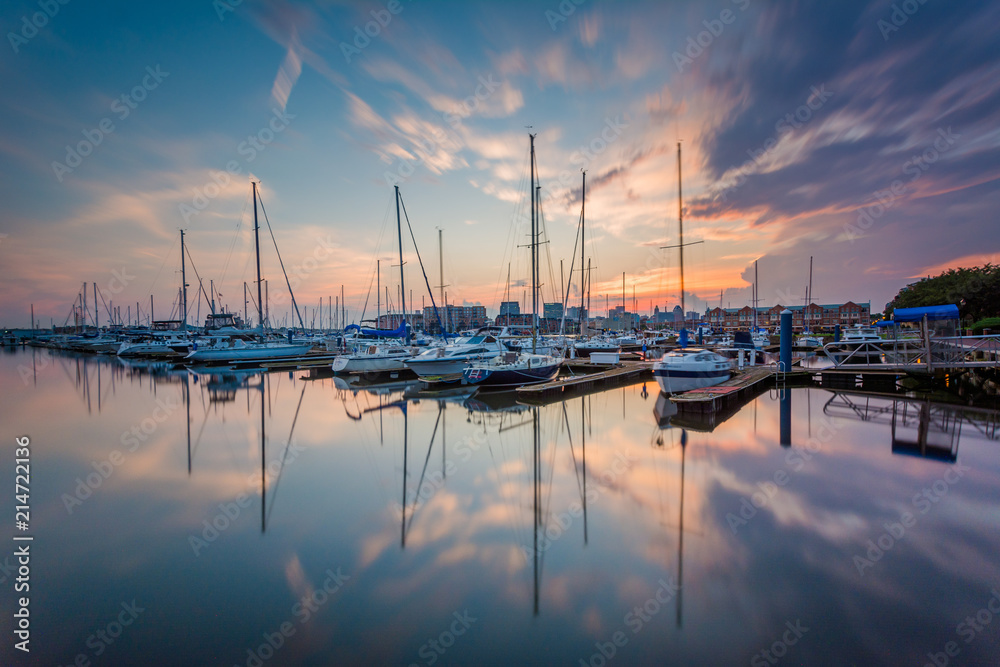 Sunset over boats on the waterfront in Canton, Baltimore, Maryland