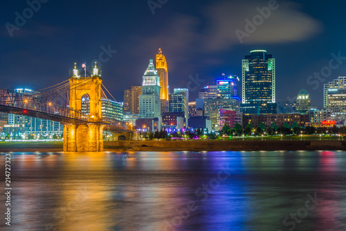 The Cincinnati skyline and Ohio River at night, seen from Covington, Kentucky,