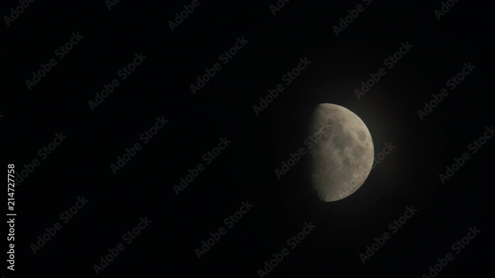 First quarter of moon month in the sky. Recorded in 4k First quarter of moon month in the sky. Recorded in 4k