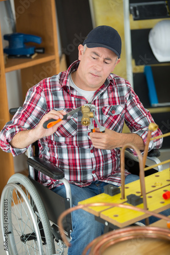 construction worker in a wheelchair