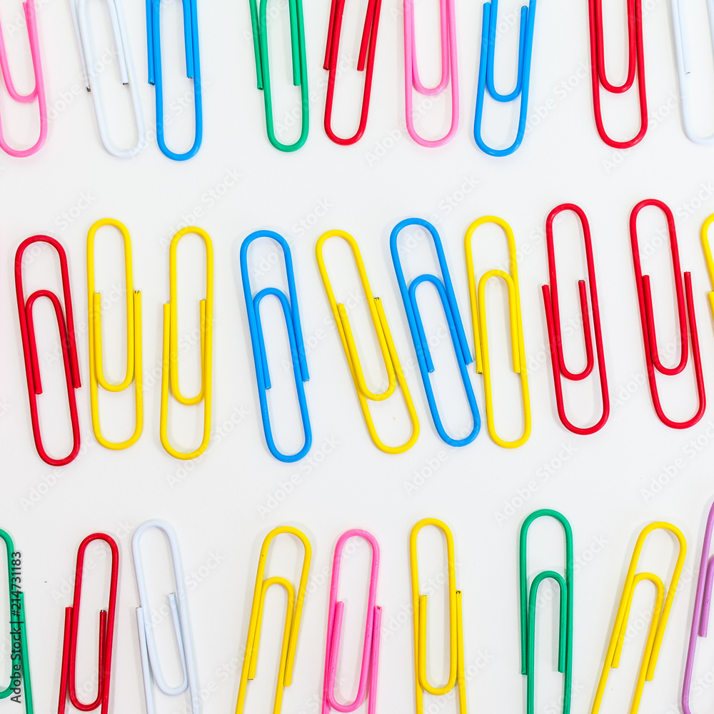 Metal paper clip isolated on a white background