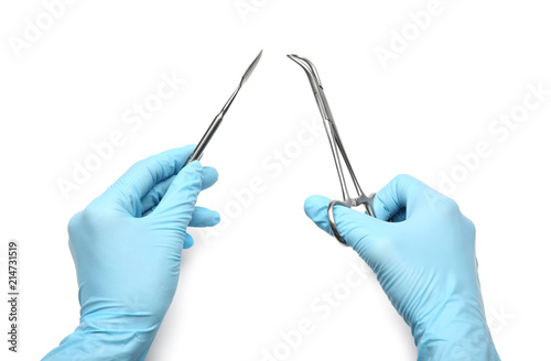 Dentist with tools on white background Fototapet