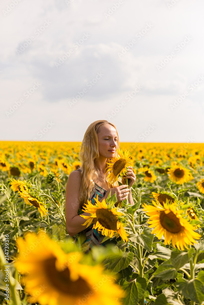 Model in sunflower field Model in sunflower field