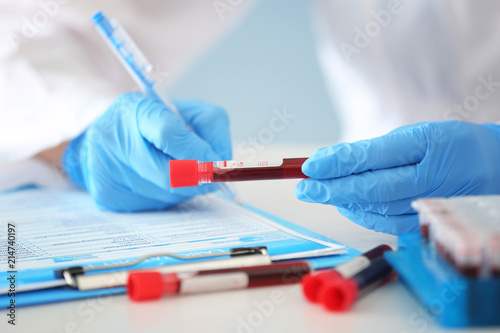 Woman working with blood sa...
