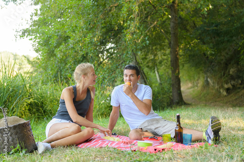 young man and woman at picnic