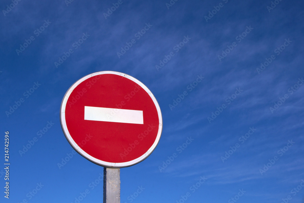 Road stop sign against clear deep blue sky Road stop sign against clear deep blue sky