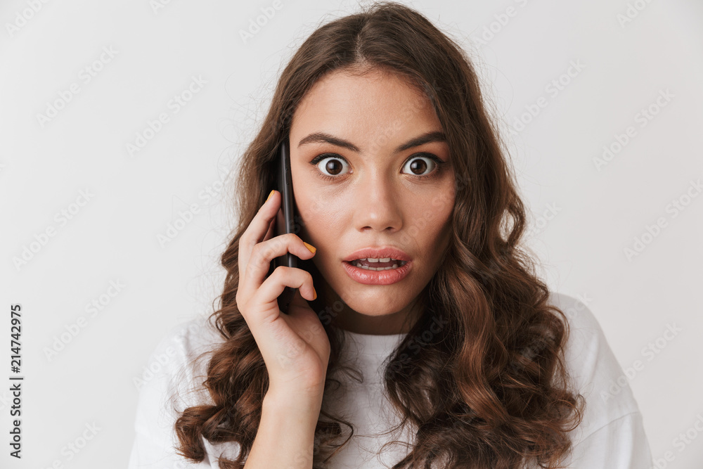 Close up portrait of a shocked young casual brunette Close up portrait of a shocked young casual brunette
