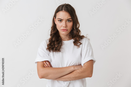 Portrait of an upset young casual brunette woman
