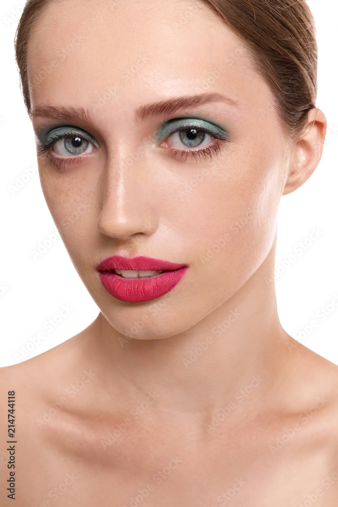 Young woman with professional makeup on white background Young woman with professional makeup on white background