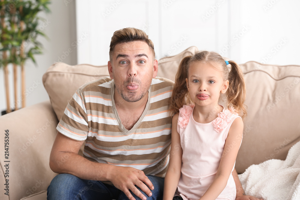Funny portrait of father and daughter at home Funny portrait of father and daughter at home