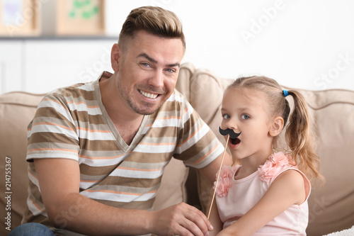 Happy father and daughter p...