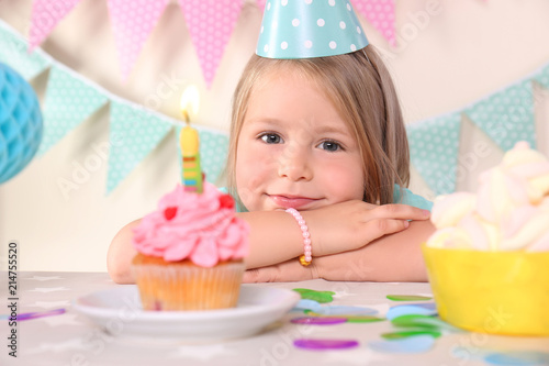 Cute little girl with tasty...