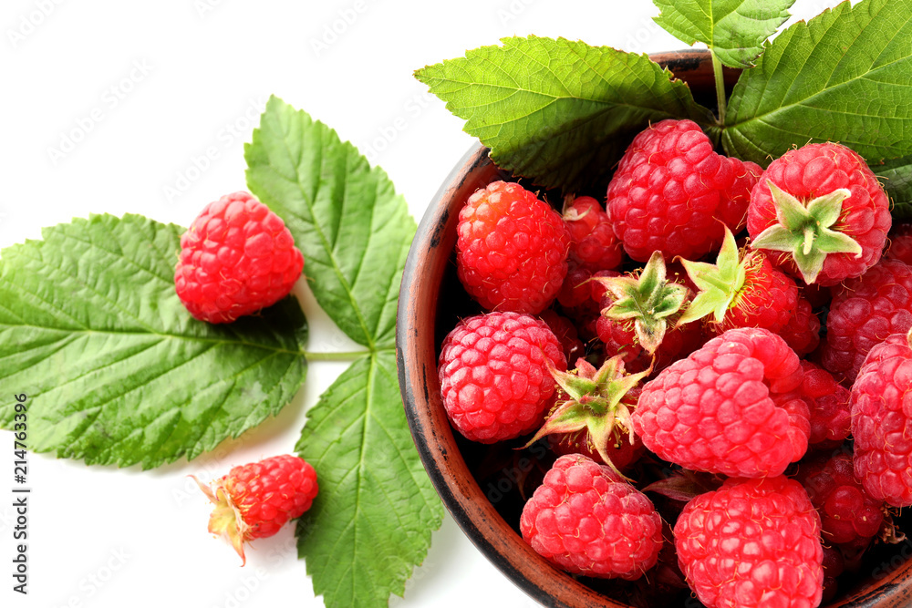 Bowl with ripe aromatic raspberries on white background, closeup Bowl with ripe aromatic raspberries on white background, closeup