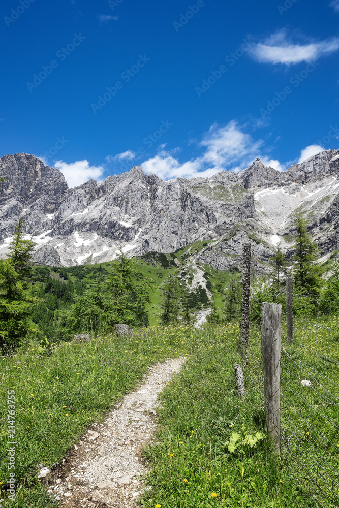 Hiking trail in front of Dachstein massif, Austria
