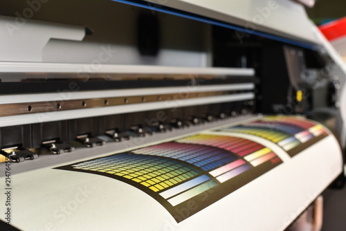 Wide format printer in work. Printing test image